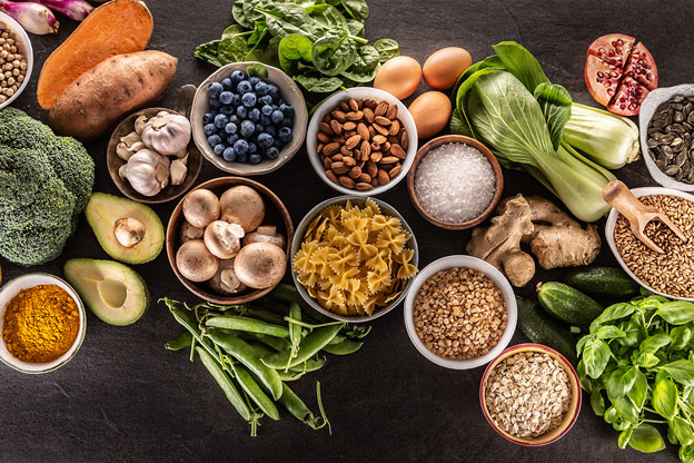 an aerial view of a table of healthy food ingredients